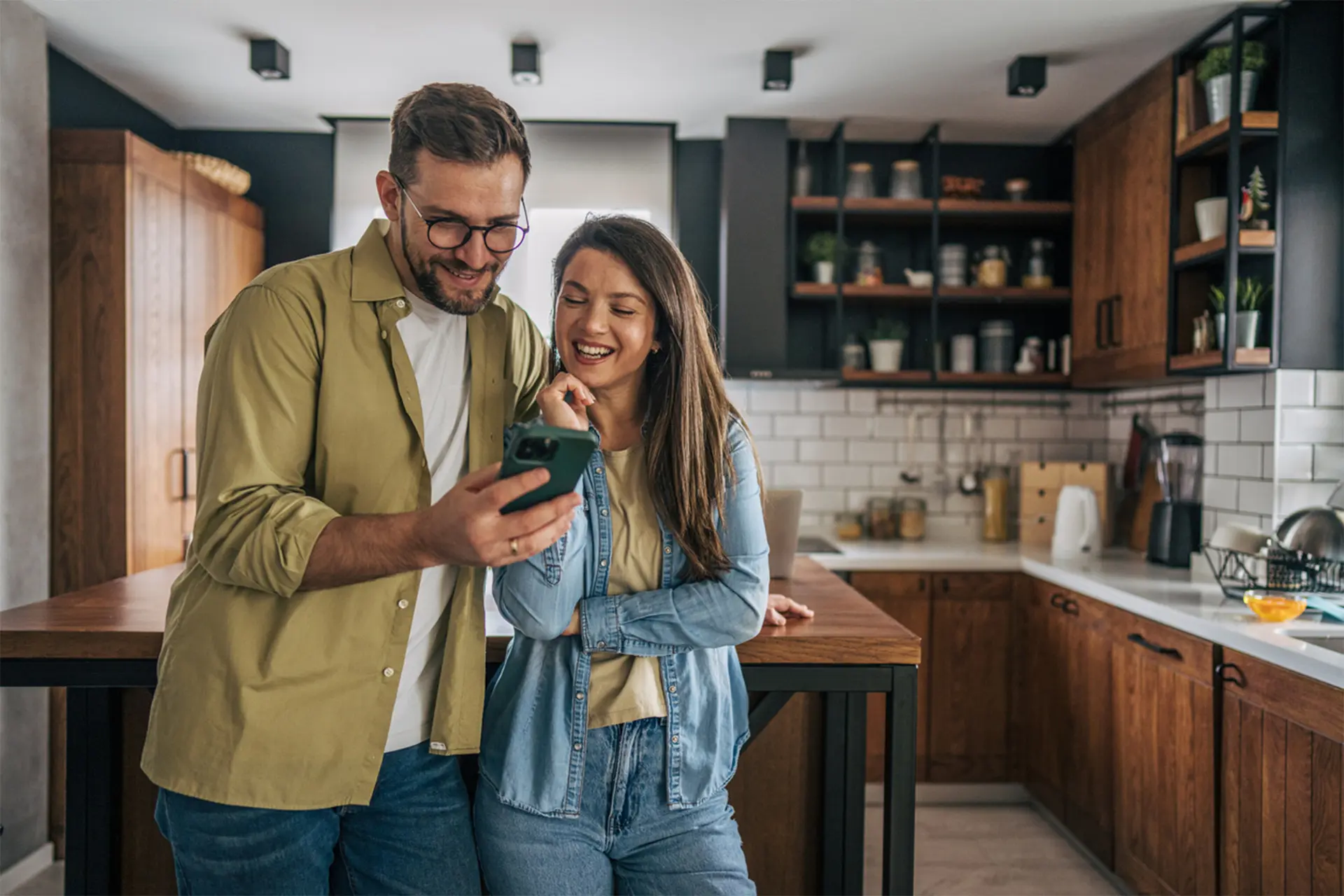 share-your-experience-ig Smiling couple in modern, updated kitchen by BestCan